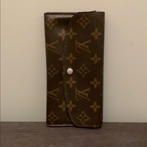Authentic LV Emilie wallet w/ red interior